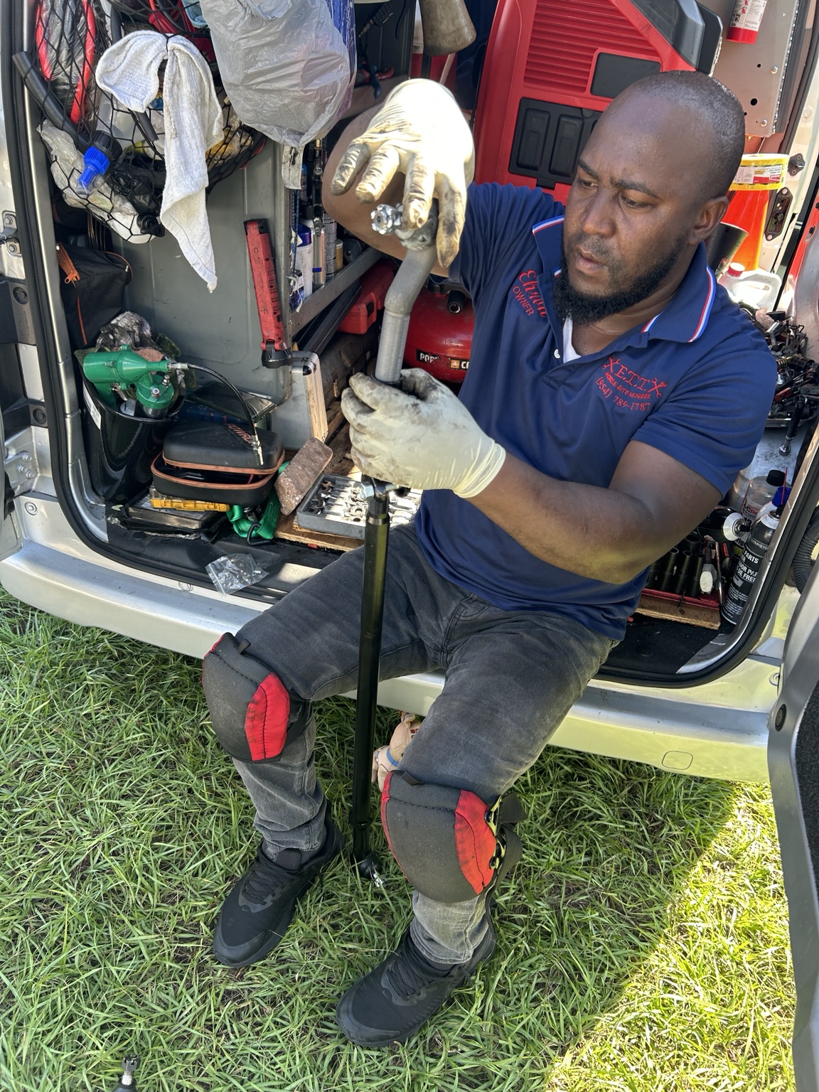 ETT Mobile Auto Mechanic working on a vehicle